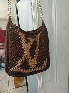 Ravelry: LV Bag pattern by Chelsea Smith.